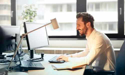 man at desk, working