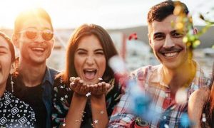 happy people celebrate with confetti laugh smile