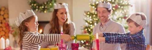 happy family celebrate christmas with candles christmas tree decorations