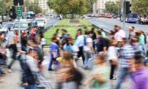 crowded busy street vibrant city people crossing roads