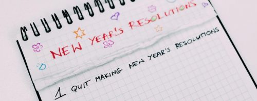 notebook details new year resolutions with subheading 1 quit making new year resolutions