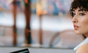 curly black hair woman worries