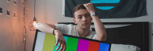 man sadly stands in film studio production