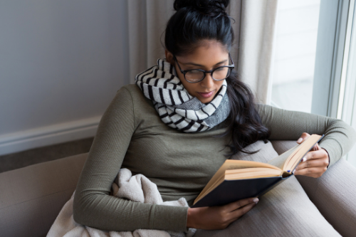woman reading selfhelp books