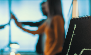 Business people high fiving and celebrating their success